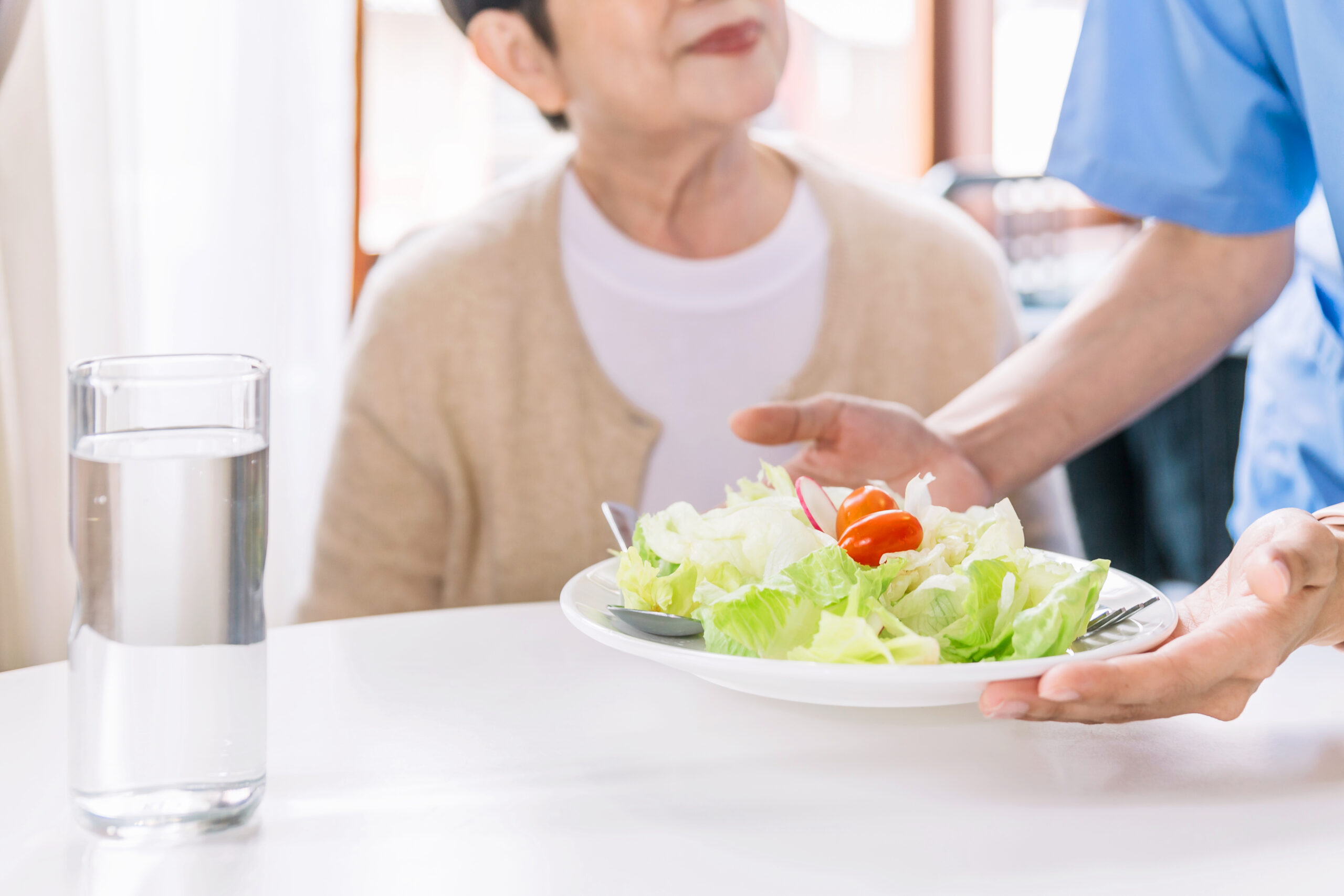 Dining tableside woman w salad dreamstime xxl 247266860